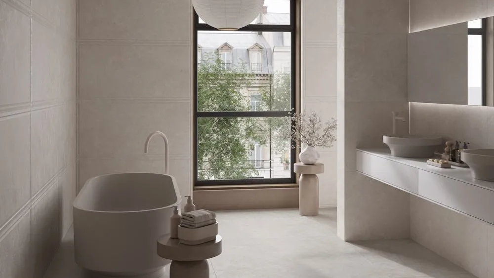 Baño con azulejos efecto monocolor en tonos neutros, colección Origin de Fanal