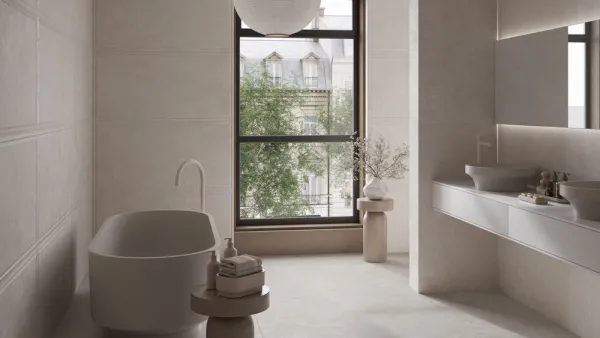 Baño con azulejos efecto monocolor en tonos neutros, colección Origin de Fanal
