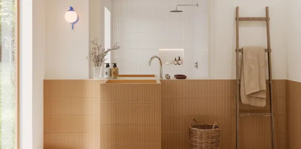 Baño con azulejos efecto monocolor en tonos cálidos, colección Pulse de Harmony