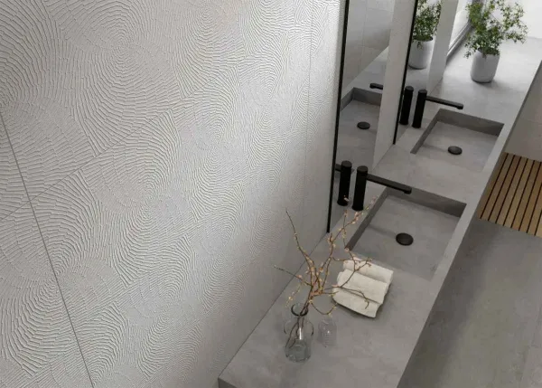 Baño con azulejos efecto monocolor en tonos neutros, colección Santorini de Metropol