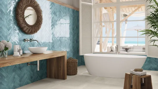 Baño con azulejos efecto monocolor en tonos fríos, colección Sorolla de Ape