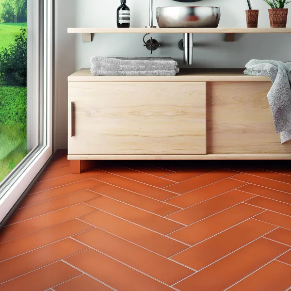 Baño con azulejos efecto monocolor en tonos cálidos, colección Stromboli de Equipe