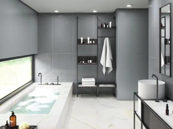 Baño con azulejos efecto monocolor en tonos neutros, colección Tonality de Ape
