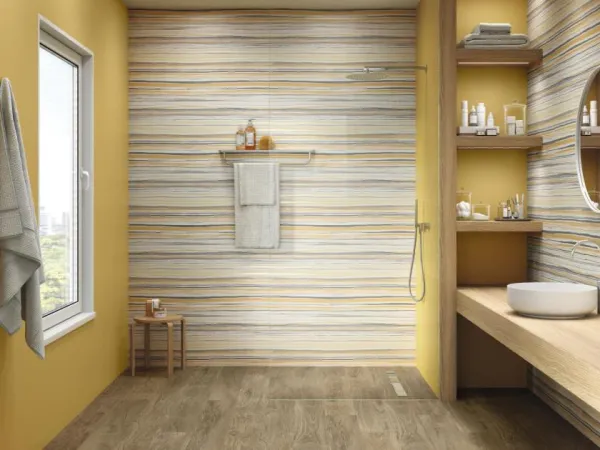 Baño con azulejos efecto monocolor en tonos cálidos, colección Tonality de Ape