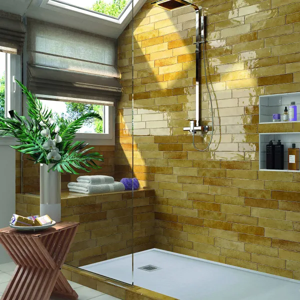 Baño con azulejos efecto monocolor en tonos cálidos, colección Tribeca de Equipe