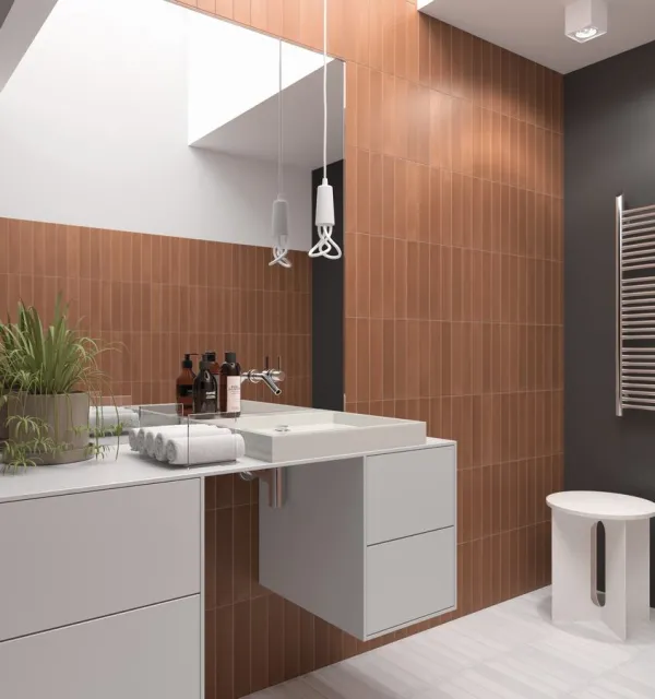 Baño con azulejos efecto monocolor en tonos cálidos, colección Wadi de Equipe