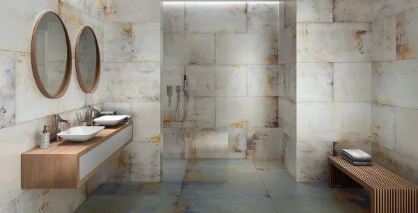 Baño con azulejos efecto óxido en tonos neutros, colección Lamiere de Apavisa