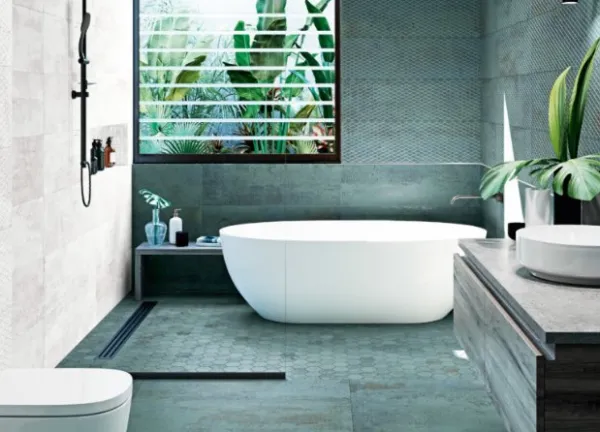 Baño con azulejos efecto óxido en tonos fríos, colección Metallic de Aparici