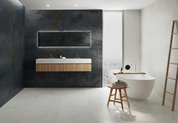 Baño con azulejos efecto óxido en tonos neutros, colección Mine de Durstone