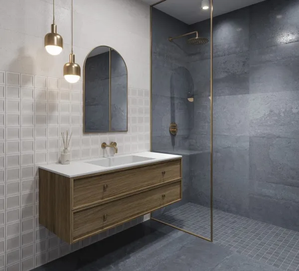Baño con azulejos efecto óxido en tonos neutros, colección Urano de Aparici