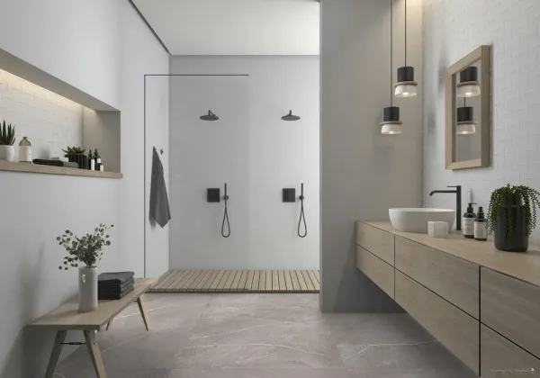 Baño con azulejos efecto piedra en tonos neutros, colección Alpi de Argenta