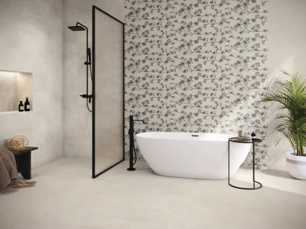 Baño con azulejos efecto piedra, colección Asphalt de Baldocer