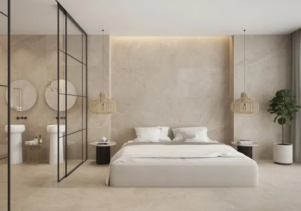 Baño con azulejos efecto piedra en tonos cálidos, colección Aura de Emotion