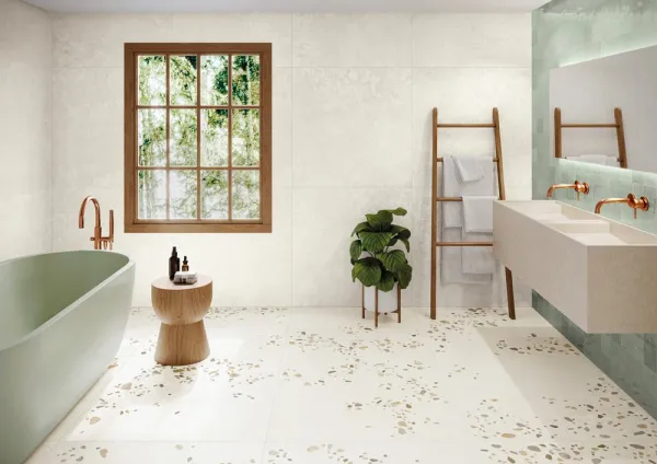 Baño con azulejos efecto piedra, colección Awen de Harmony
