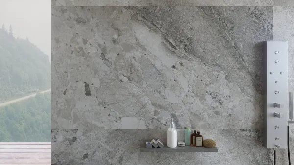 Baño con azulejos efecto piedra en tonos neutros, colección Dreamy de Museum