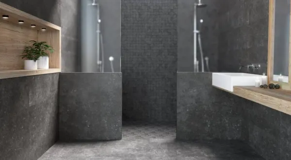 Baño con azulejos efecto piedra en tonos neutros, colección Grain stone de Navarti