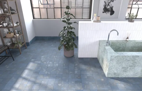 Baño con azulejos efecto piedra en tonos fríos, colección Mijaran de Dune