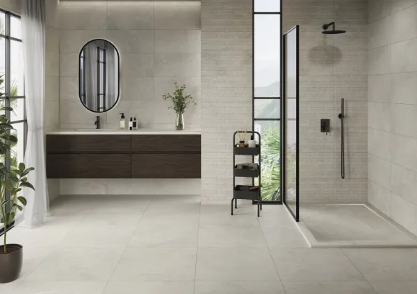 Baño con azulejos efecto piedra en tonos neutros, colección Munich de Cifre