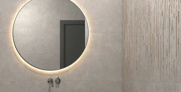 Baño con azulejos efecto piedra en tonos neutros, colección Muro de Apavisa