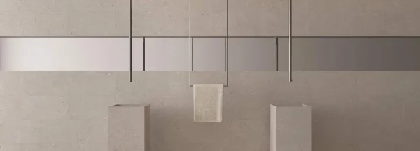 Baño con azulejos efecto piedra en tonos cálidos, colección Nordby de Undefasa