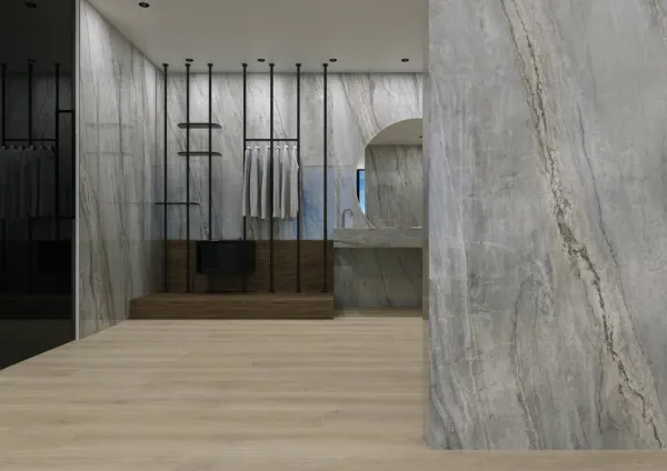 Baño con azulejos efecto piedra en tonos neutros, colección Nova de Museum