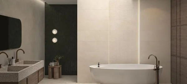 Baño con azulejos efecto piedra en tonos cálidos, colección Olatua de TAU ceràmica