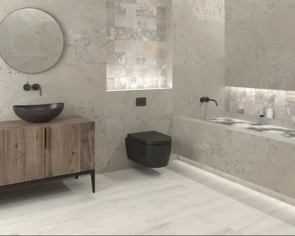 Baño con azulejos efecto piedra, colección Pietra viva de Dune