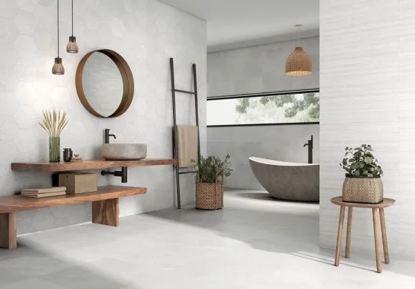 Baño con azulejos efecto piedra en tonos neutros, colección Solange de Colorker