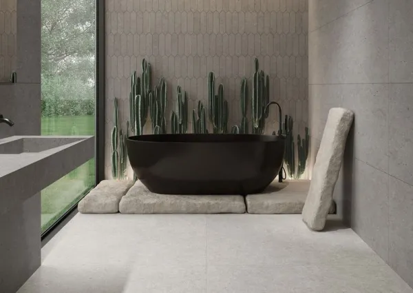 Baño con azulejos efecto piedra en tonos neutros, colección Somport de Durstone