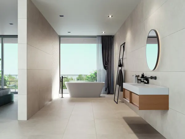 Baño con azulejos efecto piedra en tonos neutros, colección Statale de Cifre