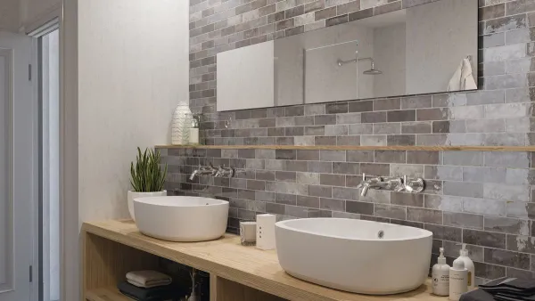 Baño con azulejos efecto piedra, colección Tennessee de Ape