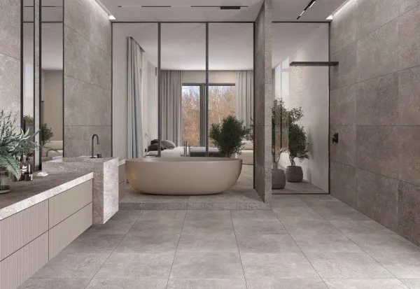 Baño con azulejos efecto piedra en tonos neutros, colección Tibet de Durstone