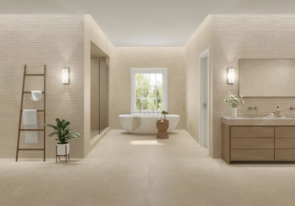 Baño con azulejos efecto piedra en tonos cálidos, colección Versa de Peronda