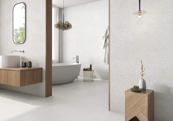 Baño con azulejos efecto piedra en tonos neutros, colección Vision de Proconcept