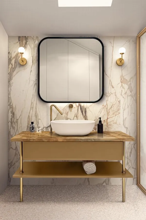 Baño con azulejos efecto terrazo en tonos cálidos, colección Frammento de Marazzi