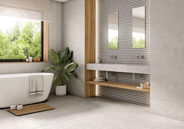 Baño con azulejos efecto terrazo, colección Linz de Proconcept