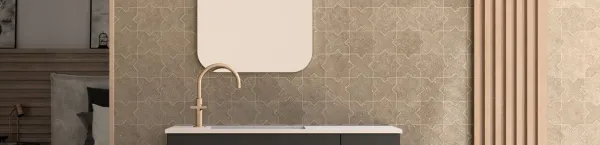 Baño con azulejos efecto terrazo en tonos cálidos, colección Terrazo de Mayolica