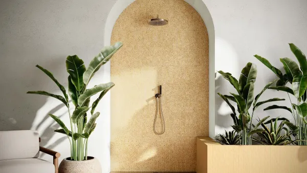 Baño con azulejos efecto terrazo en tonos cálidos, colección Terrazo de Mayolica