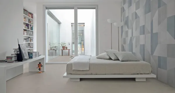 Espacio de la casa con azulejos efecto cemento en tonos neutros, colección Alchimia de Marazzi