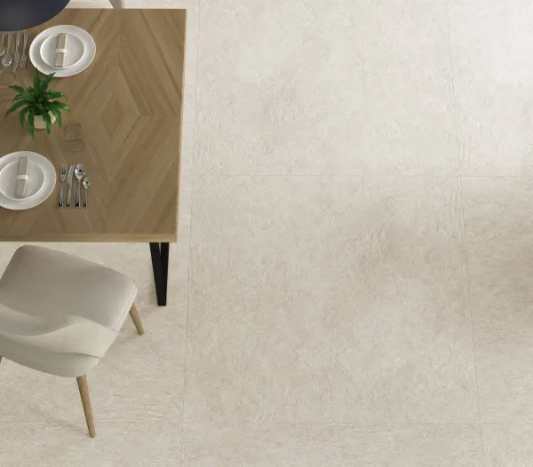 Espacio de la casa con azulejos efecto cemento en tonos cálidos, colección Infinity de Ecoceramic