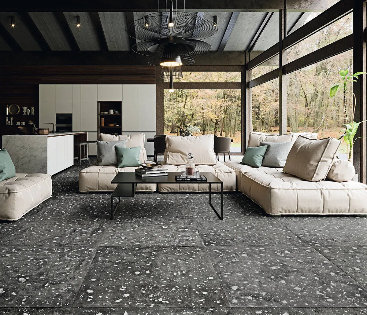 Espacio de la casa con azulejos efecto terrazo en tonos neutros, colección Petri de Land