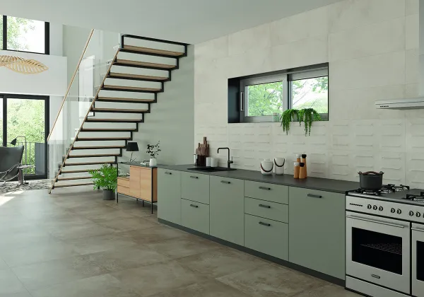 Cocina con azulejos efecto cemento en tonos neutros, colección Amstel de STN