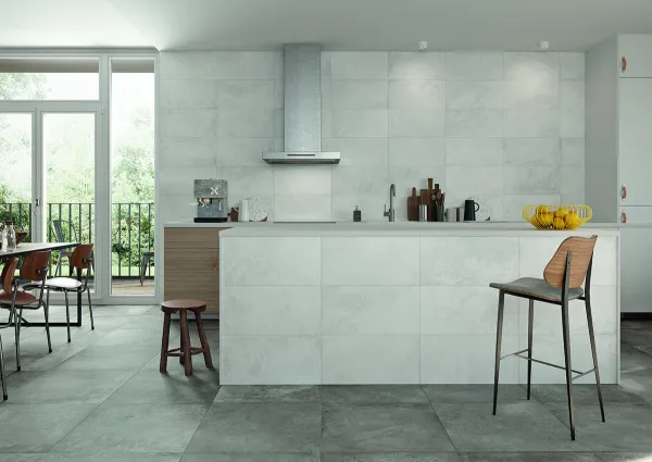 Cocina con azulejos efecto cemento en tonos neutros, colección Amstel de STN