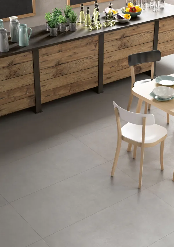 Cocina con azulejos efecto cemento en tonos neutros, colección Block de Marazzi