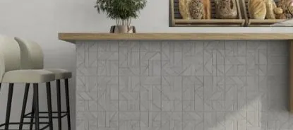 Cocina con azulejos efecto cemento en tonos neutros, colección Gravel de Argenta