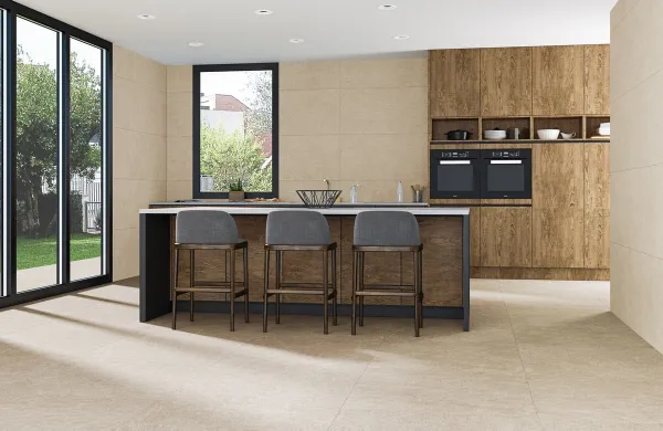Cocina con azulejos efecto cemento en tonos cálidos, colección Infinity de Ecoceramic