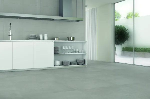 Cocina con azulejos efecto cemento en tonos neutros, colección Neutra de Cifre