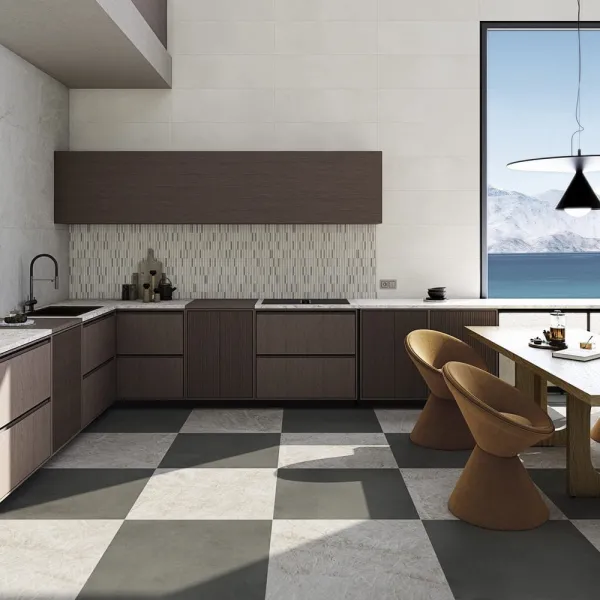 Cocina con azulejos efecto cemento en tonos neutros, colección Nuages de Vives