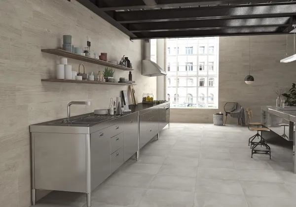 Cocina con azulejos efecto cemento en tonos neutros, colección Powder - dust de Argenta