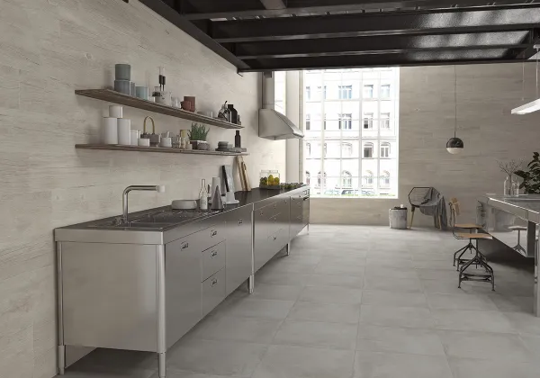 Cocina con azulejos efecto cemento en tonos neutros, colección Powder - dust de Argenta